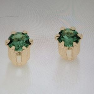 Gold stud earrings in green